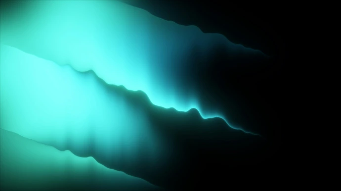 Abstract glowing turquoise waves against black background